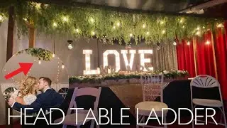 Head Table Floral Arrangements - DIY Greenery Canopy
