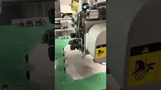 Rotating Head CNC Stitching Machine in JIAM Japan with camera positioning and safety fence