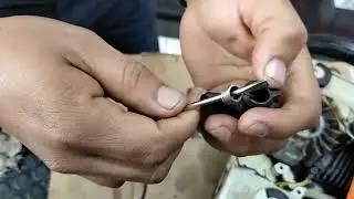 como reconectar el cable de la bobina o (módulo de ignición)de una motosierra