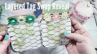 Layered tag swap reveal