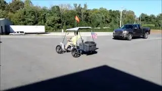 Rhoades Two Person Cycle Car with CanopOnline at Tays Realty & Auction, LLC