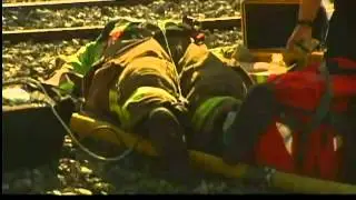 Flames rekindle at brush fire scene