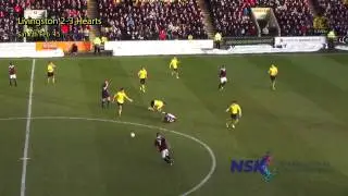 Livi's Jason Talbot tackles Hearts player, Sam Nicholson.