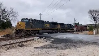 YN3b AC44 pair hauls ballast train westbound through Lagrange GA. 12/6/2025 2:47 PM