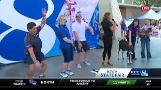 KCCI's Ben Kaplan tries goat yoga at the Iowa State Fair