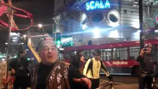 Cycling poet at King's Cross raps to demo