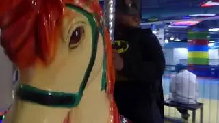Bat Man and Superman and Elsa and Anna  ride the  playing  horse game in the play ground
