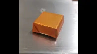 Envelop wrapping machine plus coding unit for chocolate