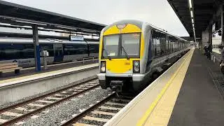 TRANSLINK TRAIN arriving at BELFAST GRAND CENTRA IN STATION in NORTHERN IRELAND