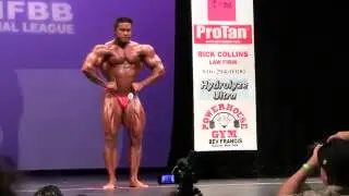 Stan McQuay posing at the 2014 NY Pro Bodybuilding Show