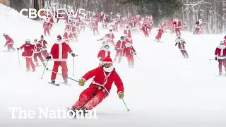 #TheMoment hundreds of skiing Santas hit the slopes