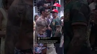 Max Holloway & Dustin Poirier hug backstage after UFC 318