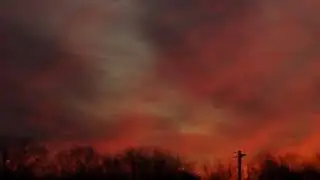 Fiery red & orange skies before winter storm FERN in Oklahoma sunrise 