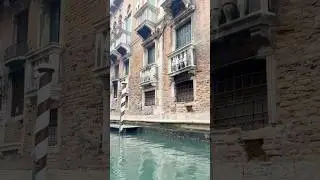 Venice boat tour between canals