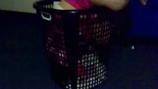 Thalia Skye in the laundry basket
