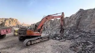 EX200 Excavator Rock Breaking & Earthmoving WorkHitachi EX200 at Construction Site
