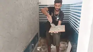 Tiles cutting and making work process in building brick wall plaster 