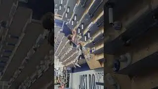 Young Climber Conquers Challenging Indoor Wall