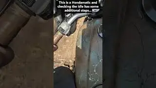 Using a portable inductive tach to check idle on a vintage bike