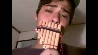 Titanic playing with small pan flute By Mario Pi&ntilde;a