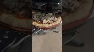 Cooking a pizza on the Weber Jumbo Joe with the Onlyfire pizza oven and rotisserie￼