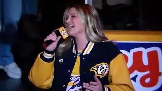 Katie Ohh sings the Canadian National Anthem before Nashville Predators vs. Edmonton Oilers NHL game