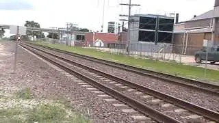 UP 6448 heads west thru Rochelle with another hopper train 6-1-13
