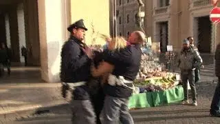 Feminist goes topless in Vatican abortion protest