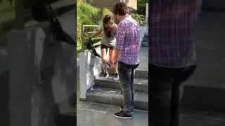 Young CP girl coming downstairs.