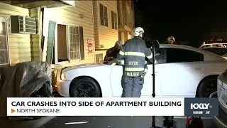 Car crashes into side of local apartment building