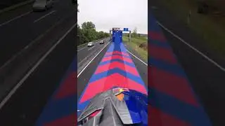 INSANE Motocross Backflip Between Two Moving Semi Trucks