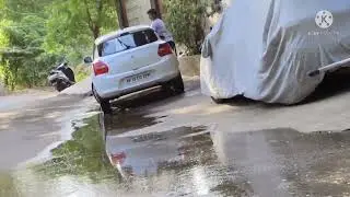 Father and son washing the car.from a middle class family.