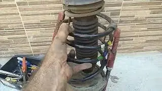 Como tirar o amortecedor dianteiro do c4 Pallas
