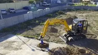 Earth Drill 7000MAX drilling through concrete foundations
