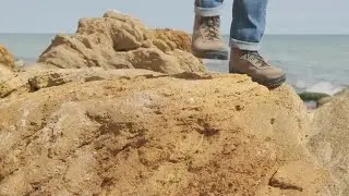 Walking On Rocky Shore Stock Video