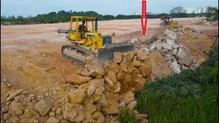 Best Technique Skill operator bulldozer pushing big stone Filling Foundations with Dump Trucks