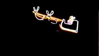 Santa in Lights Arriving at Aspen Helicopters
