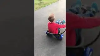 Whit on a hover board cart