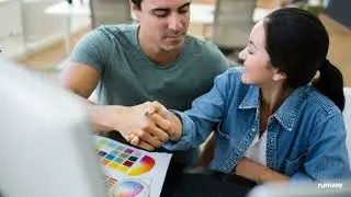 Two people shaking hands, close up shot, professional setting, natural lighting, subtle camera movem