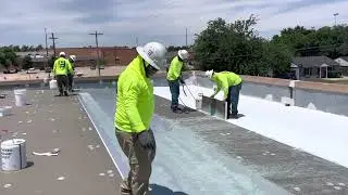 Applying Versico Cav Grip spray adhesive