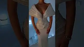 To order this crystal corset gown DM This sculpted column silhouette is designed with a