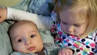 big sister loves her baby brother