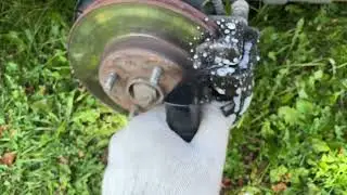 Cleaning the front calipers of a Kia Rio