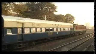 CHURCHGATE SLOW EMU OVERTAKING BL WCAM2 21865 WITH RDSO COACHES NEAR DADAR