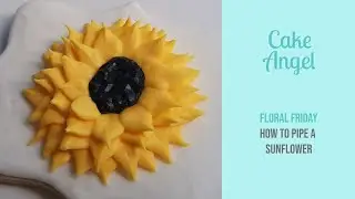 Royal icing flowers | How to pipe a Sunflower with icing | LEFT HANDED