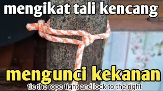 Mengikat tali kencang mengunci kekanan(tie the rope tight and lock it to the right)