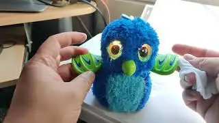 Cleaning my blue hatchimal.  baby wipes, soapy hand towel