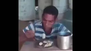 Man eating bananas gets attacked by dog