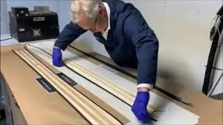 Hot melt gluing plastic strips to wood with hot melt rollcoater