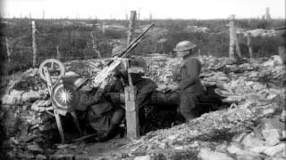 US troops fire a mounted gun from a dugout in France during World War I. HD Stock Footage